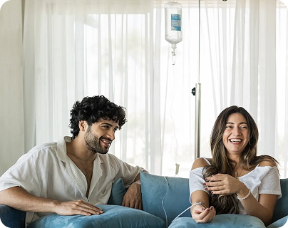 Couple enjoying IV therapy at REVIV Hyderabad